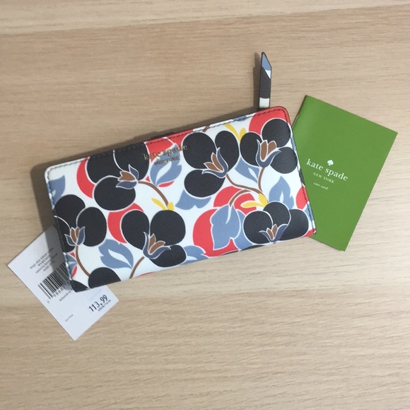 kate spade Handbags - 💕Sunday Sale💕Kate Spade Large Slim Bifold Wallet